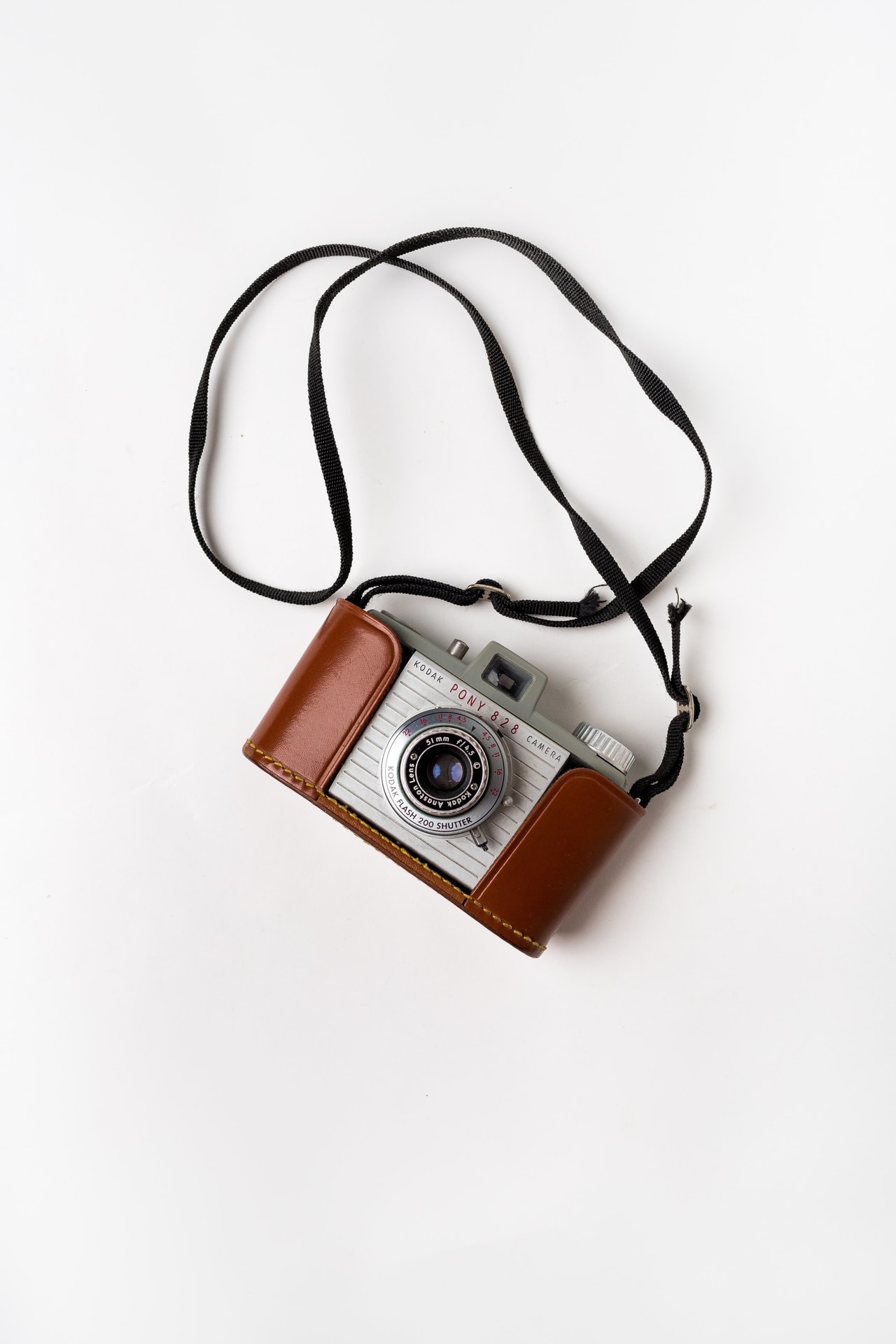 Vintage kodak foto kamera med læder kappe og rem